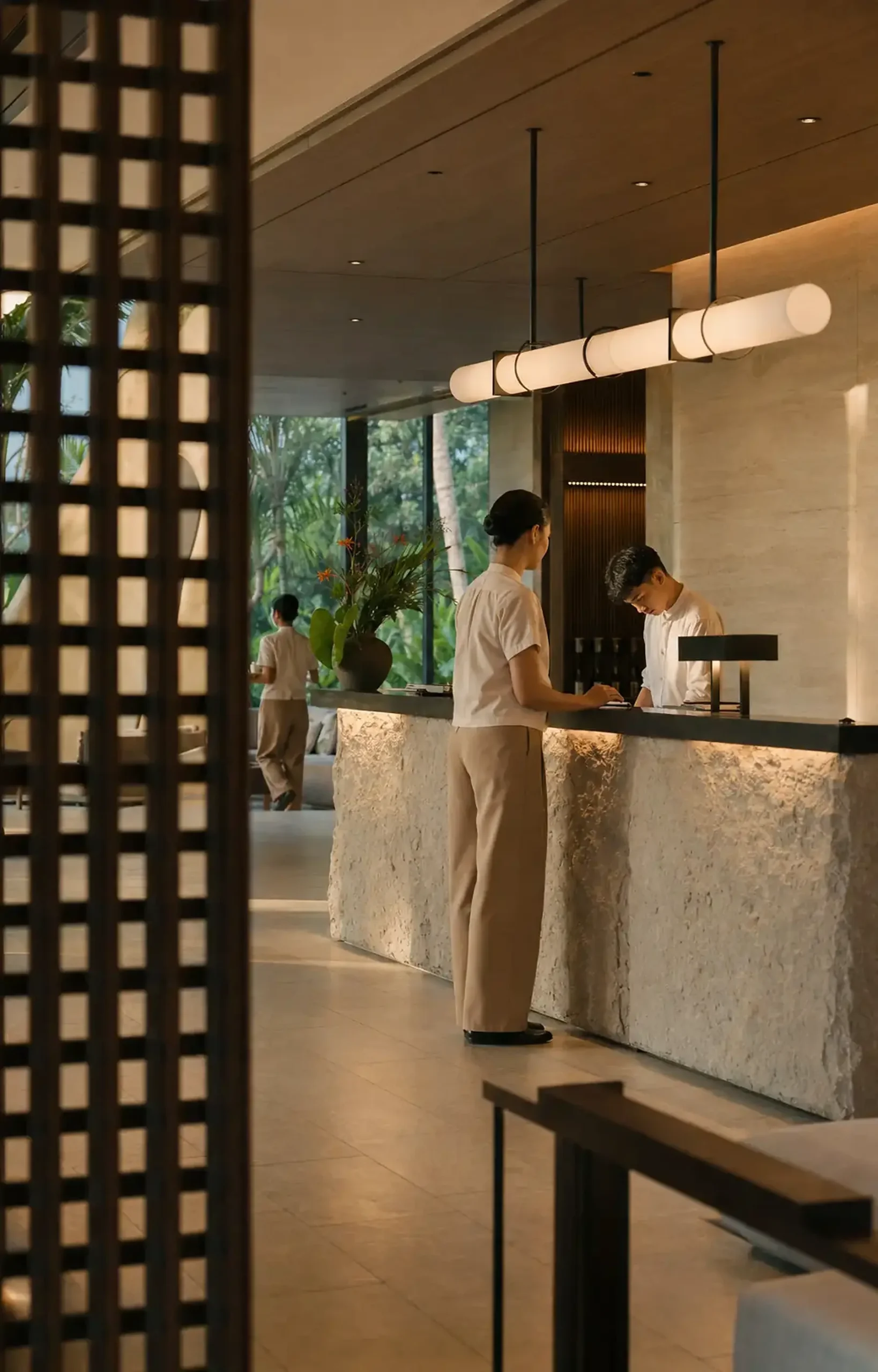Hospitality team preparing a refined contemporary reception desk